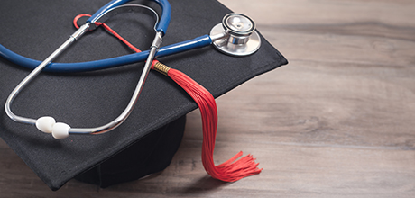 grad cap and stethoscope