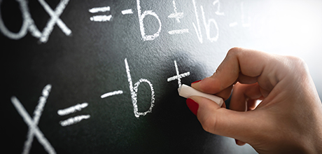 hand writing on chalkboard