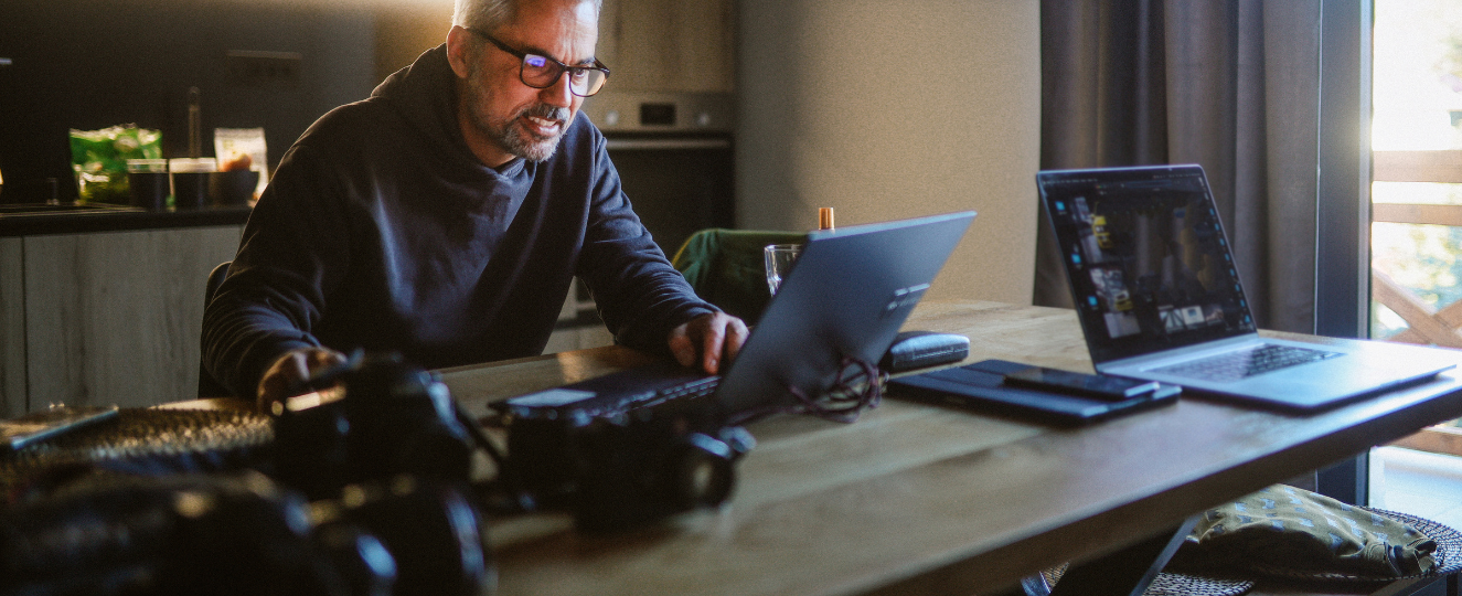 Person editing images on a computer