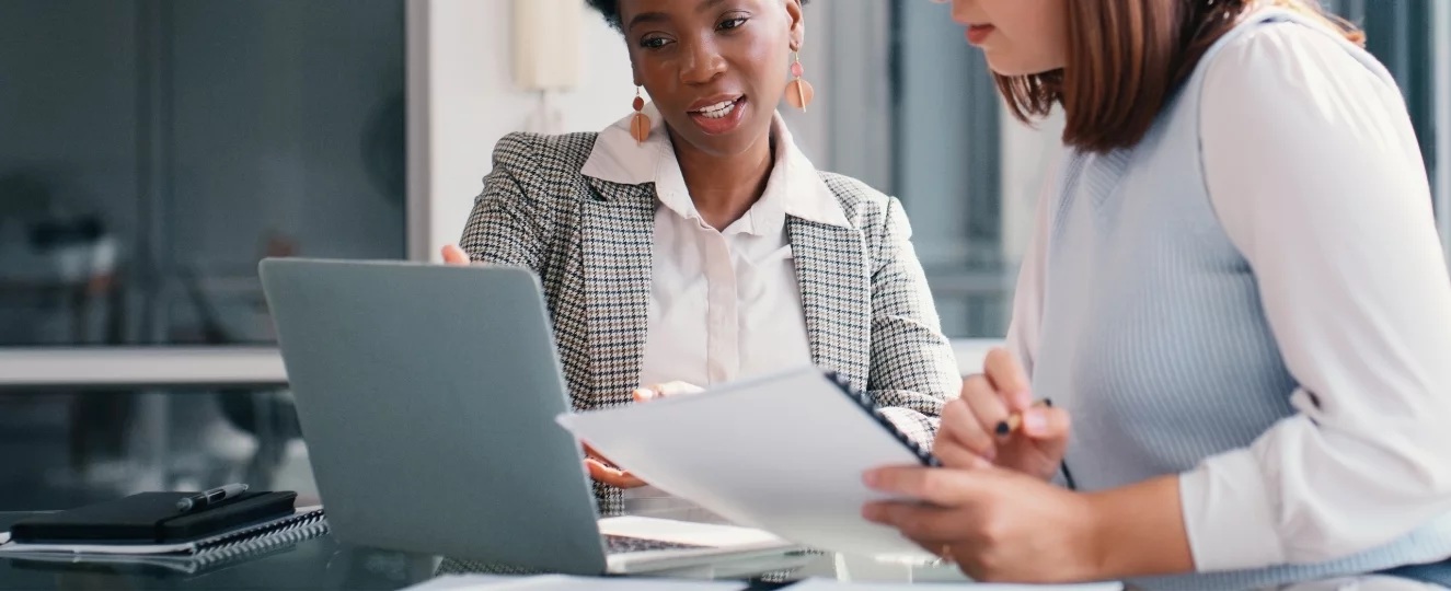 HR Professionals Discussing Paperwork